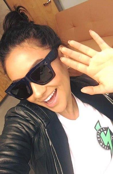 Shay Mitchell taking a selfie