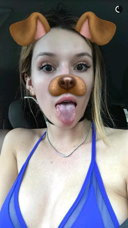 Bella Thorne in a bikini taking a selfie