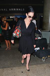 Dita Von Teese arrives from a flight at LAX August 20, 2014