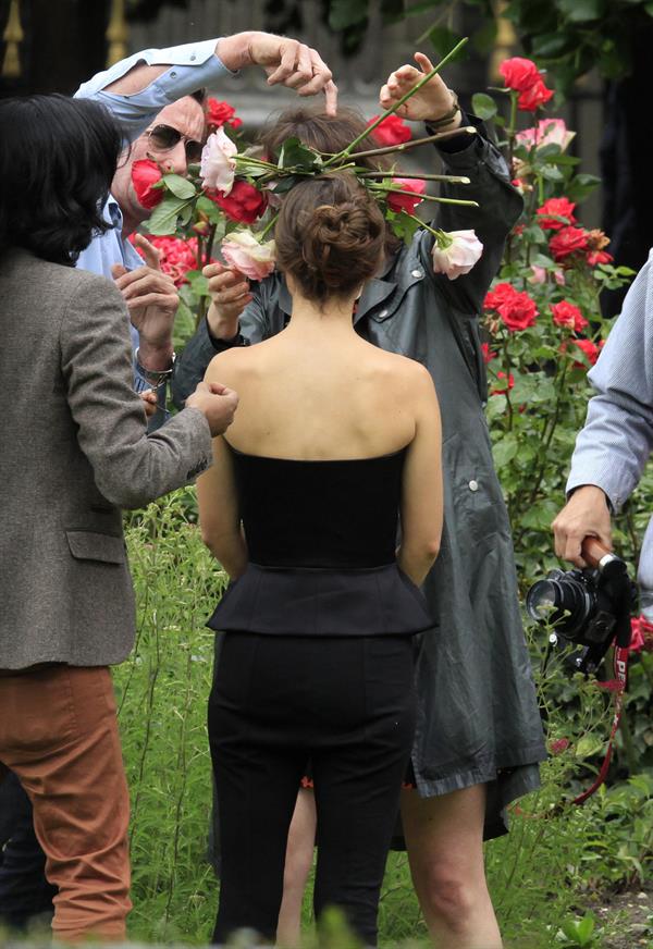 Natalie Portman modeling for a Miss Dior campaign photo shoot in the gardens of the Palais Royal in Paris 6/26/12 