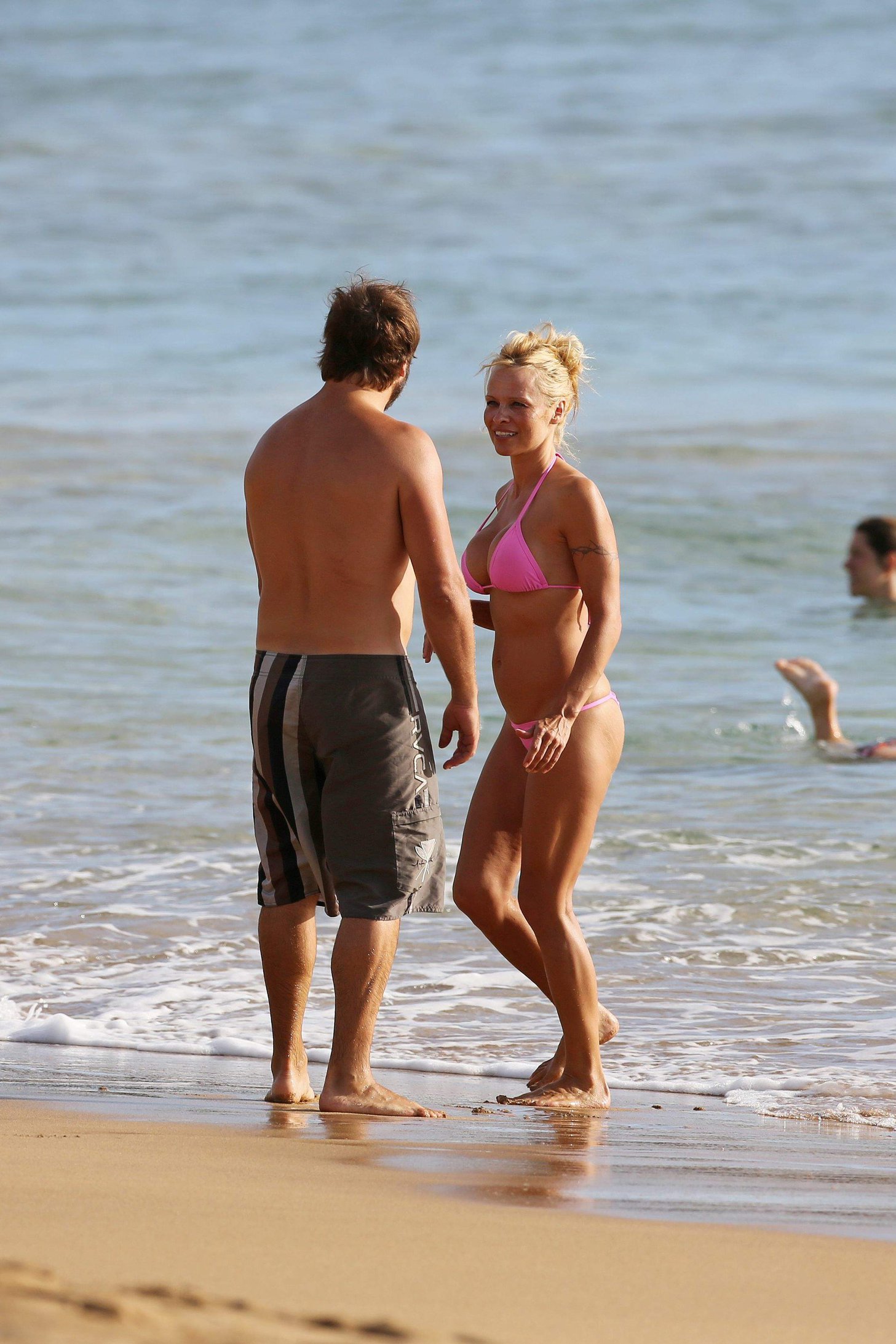 Pamela Anderson Wearing bikini on the beach in Hawaii - August 8, 2013 
