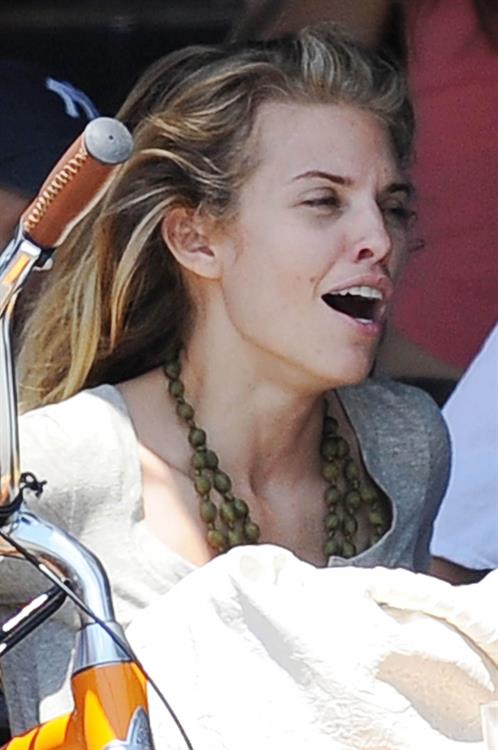 AnnaLynne McCords dress blew up to reveal her underwear in Venice, August 20, 2014