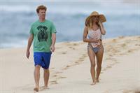 Pamela Anderson Takes a walk in bikini bottoms on the Island of Maui December 30, 2012 