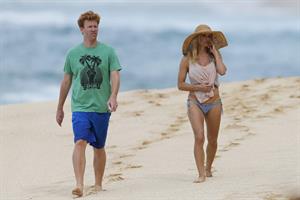 Pamela Anderson Takes a walk in bikini bottoms on the Island of Maui December 30, 2012 