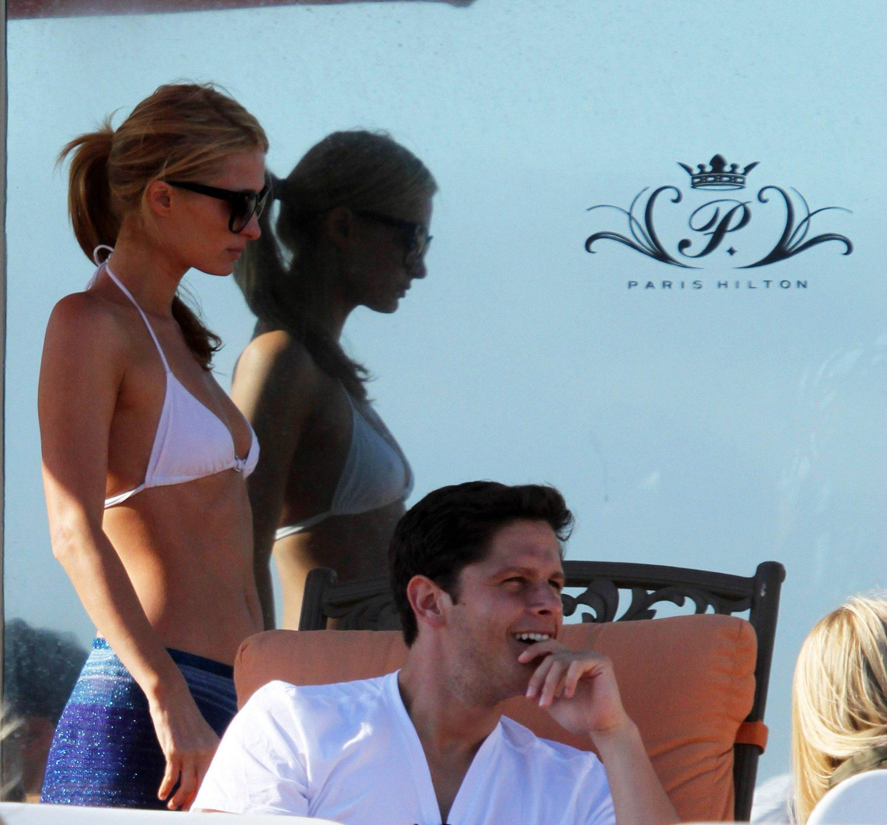 Paris Hilton a party on the beach in Malibu July 27, 2013