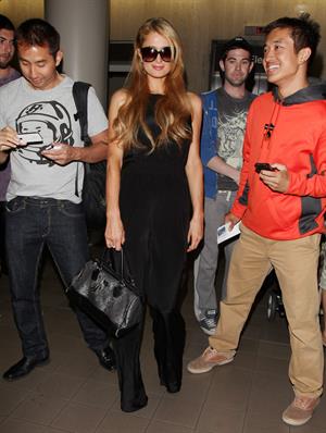 Paris Hilton arrive at LAX Airport 9/30/13