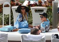 Paris Hilton spends the day in and out of the pool in Miami December 8, 2012