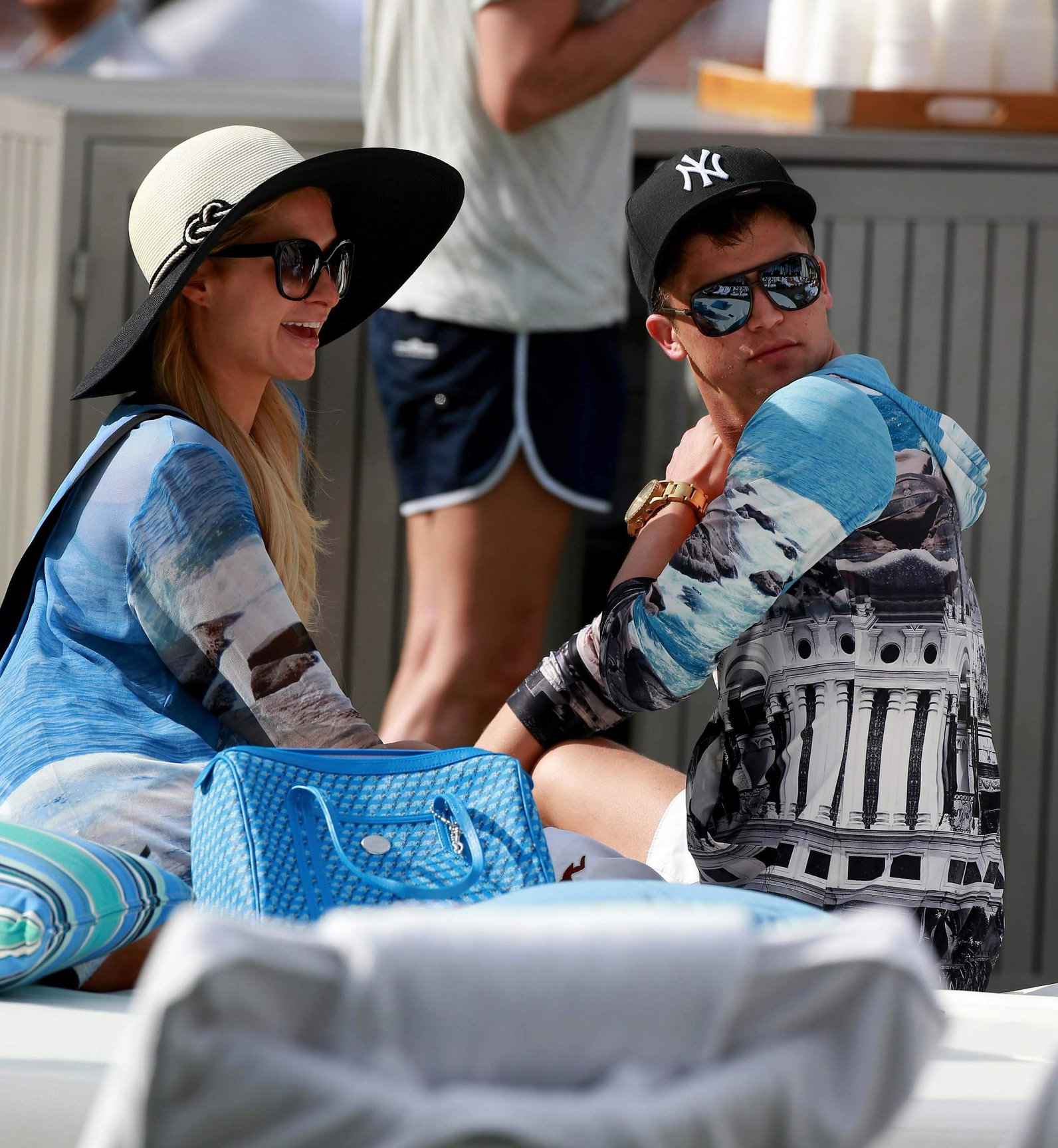 Paris Hilton spends the day in and out of the pool in Miami December 8, 2012