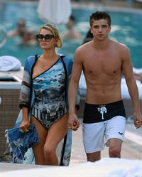 Paris Hilton spends the day in and out of the pool in Miami December 8, 2012