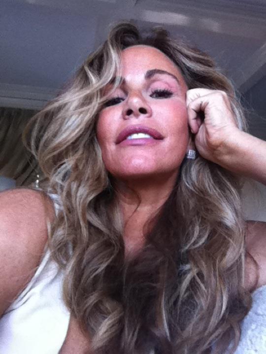 Tawny Kitaen taking a selfie