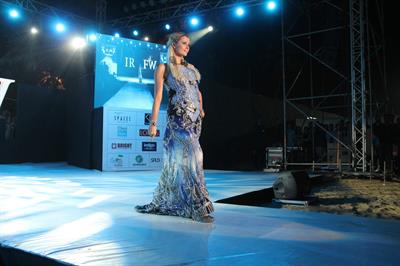 Paris Hilton walks for designer duo Shane and Falguni Peacock and performs as a DJ at the India Resort Fashion Week