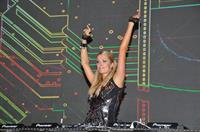 Paris Hilton walks for designer duo Shane and Falguni Peacock and performs as a DJ at the India Resort Fashion Week