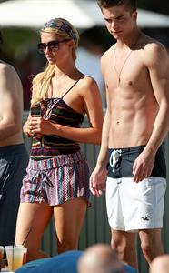 Paris Hilton poolside at their Miami hotel December 7-2012 