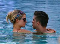 Paris Hilton poolside at their Miami hotel December 7-2012 
