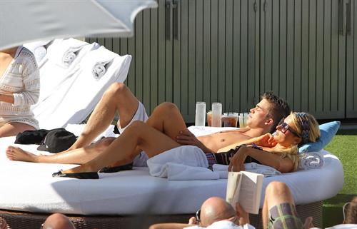 Paris Hilton poolside at their Miami hotel December 7-2012 