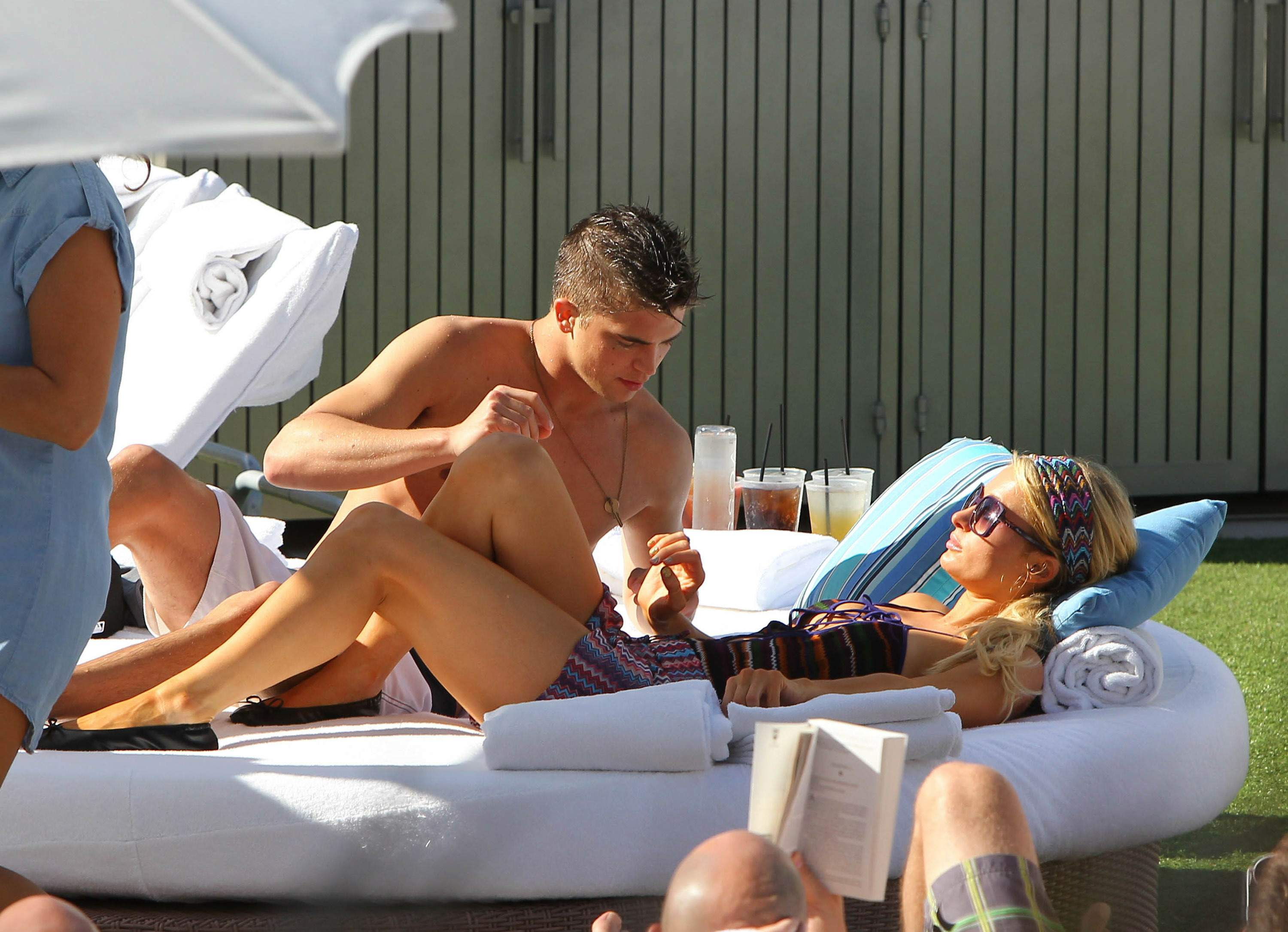Paris Hilton poolside at their Miami hotel December 7-2012 
