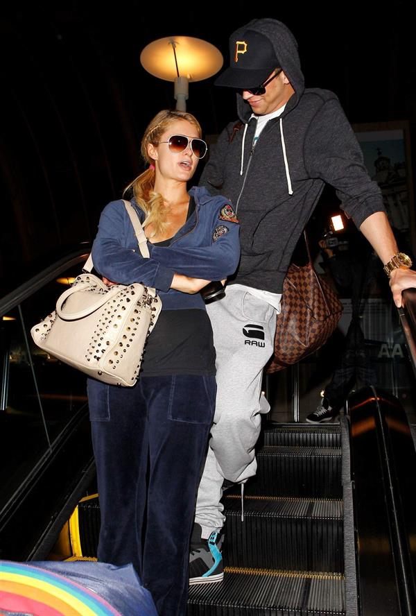 Paris Hilton and River Viiperi holding hands at LA. December 10, 2012 