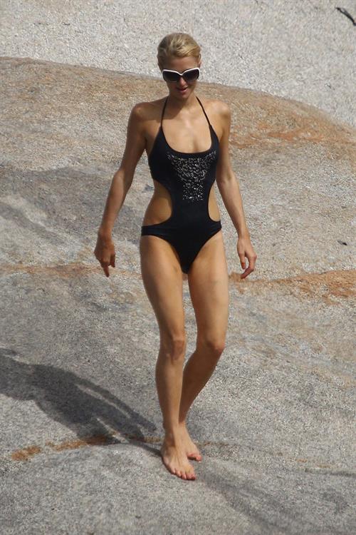 Paris Hilton - Wearing a swimsuit at a beach in France August 6, 2012
