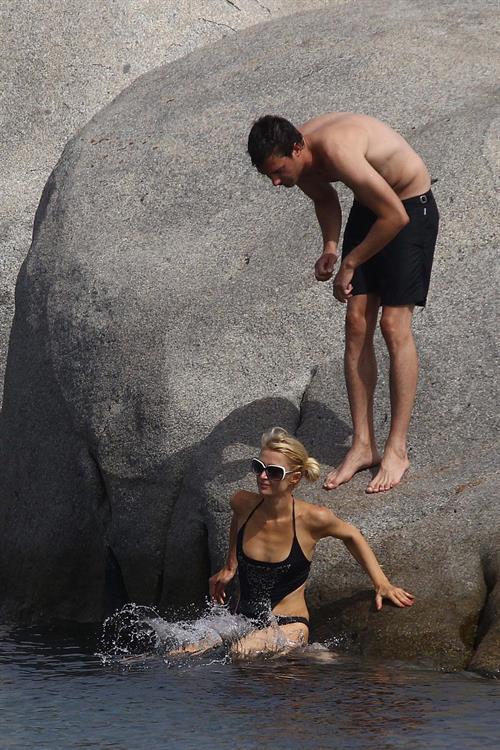 Paris Hilton - Wearing a swimsuit at a beach in France August 6, 2012