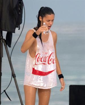 Adriana Lima – beach shoot candids in Cancun 12/2/13 