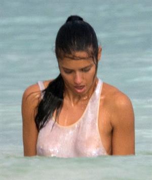 Adriana Lima – beach shoot candids in Cancun 12/2/13 