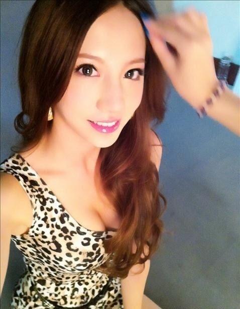 Lin Cai Ti taking a selfie