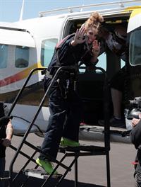 AnnaLynne McCord skydives from 18,000 feet at a charity event, Lompoc August 16, 2014