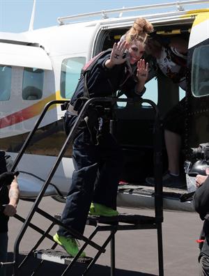 AnnaLynne McCord skydives from 18,000 feet at a charity event, Lompoc August 16, 2014
