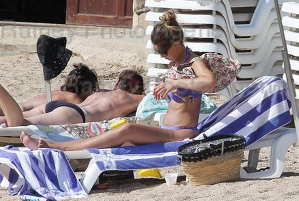 Marie-Ange Casta in a bikini - ass