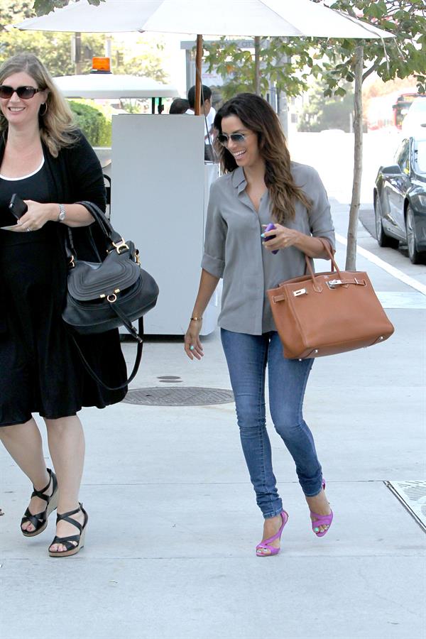 Eva Longoria stops by the CAA Office looking Business Chic August 14, 2014
