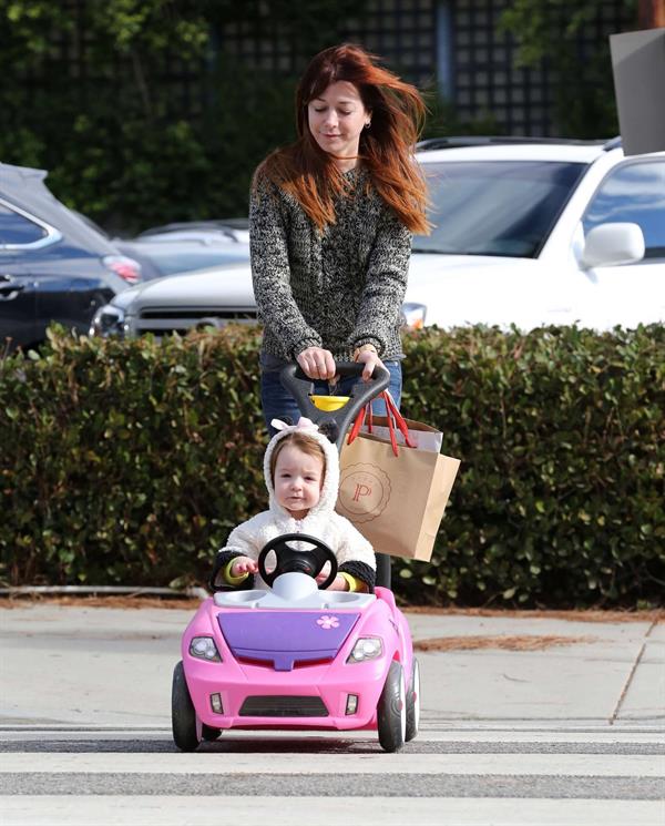 Alyson Hannigan Hangs out with her daughter in Los Angeles (November 22, 2013) 