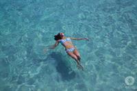 Nicole Harrison in a bikini