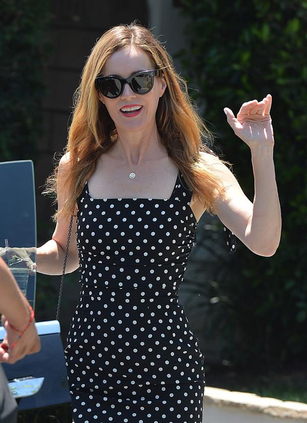 Leslie Mann leaves a private party in Brentwood on August 10, 2014 wearing a black and white polka dot dress