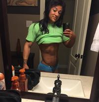 Jacquelyn Hickerson in a bikini taking a selfie