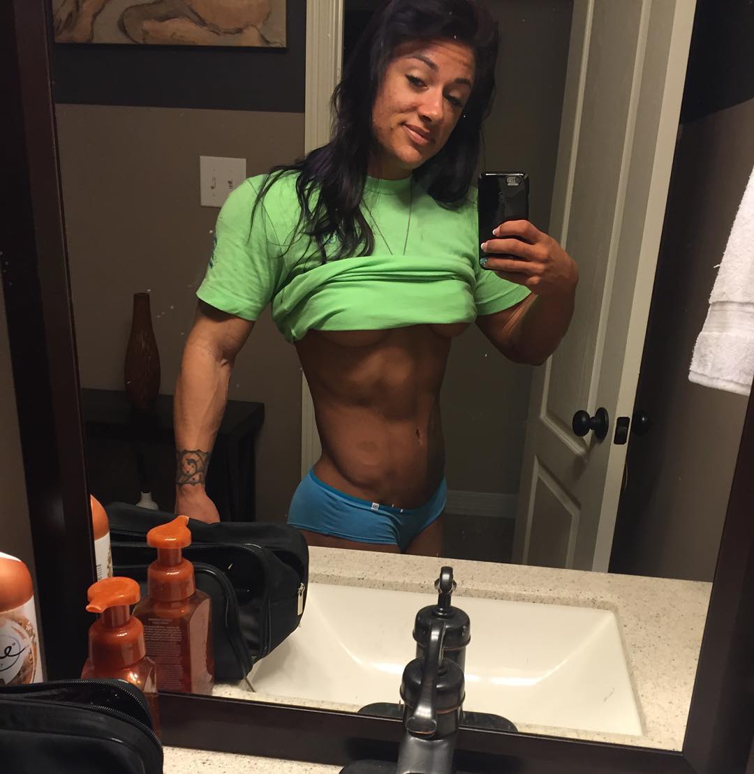 Jacquelyn Hickerson in a bikini taking a selfie