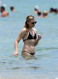 Chloe Grace Moretz candids in a Black Bikini in Miami Beach
