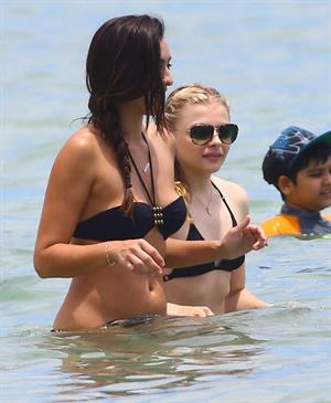 Chloe Grace Moretz candids in a Black Bikini in Miami Beach