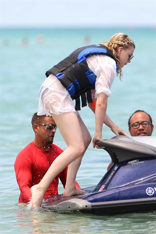 Chloe Grace Moretz candids in a Black Bikini in Miami Beach