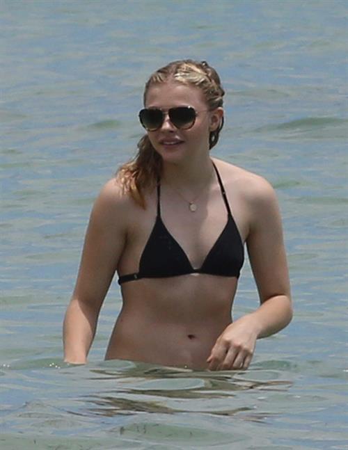 Chloe Grace Moretz candids in a Black Bikini in Miami Beach