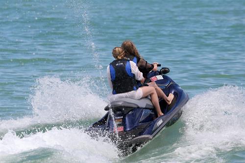 Chloe Grace Moretz candids in a Black Bikini in Miami Beach