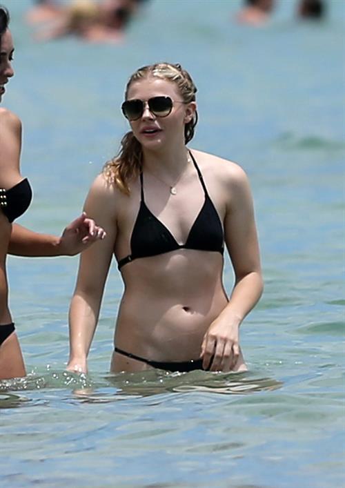 Chloe Grace Moretz candids in a Black Bikini in Miami Beach