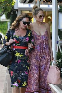 Jennifer Lopez and Leah Remini shopping at Fred Segal in Los Angeles on July 30, 2014