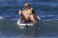 Ireland Baldwin goes paddle-boarding in Hawaii with her boyfriend Slater Trout May 26, 2013 