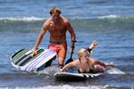 Ireland Baldwin goes paddle-boarding in Hawaii with her boyfriend Slater Trout May 26, 2013 