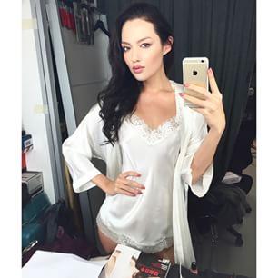 Mia Kang taking a selfie