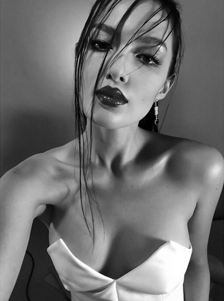 Mia Kang taking a selfie