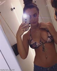 Courtney Knox in a bikini taking a selfie