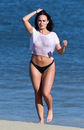 Hayley Fanshaw in a see through top on a beach in Spain