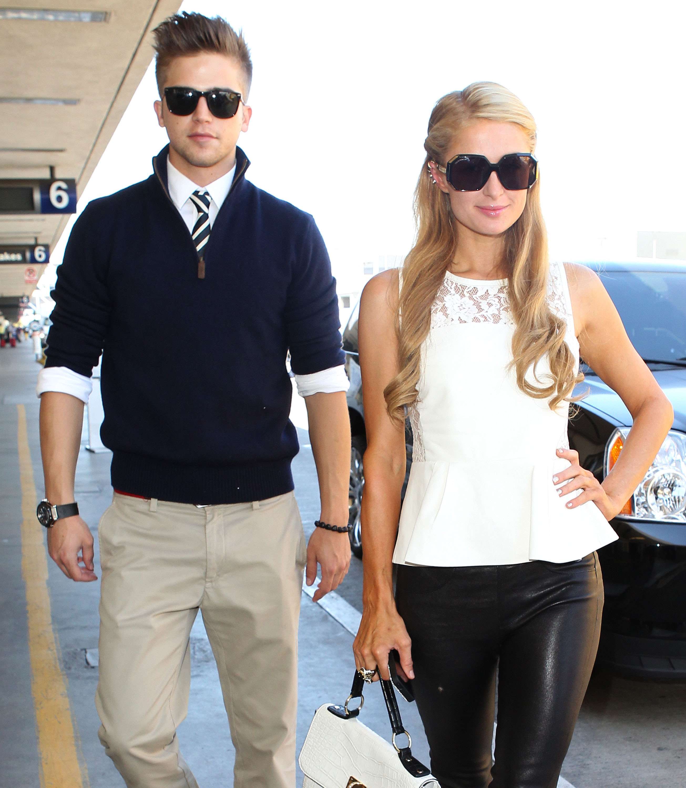 Paris Hilton Arrives at LAAirport in Los Angeles (September 6, 2013) 