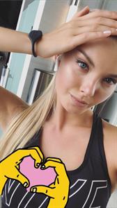 Polina Popova taking a selfie